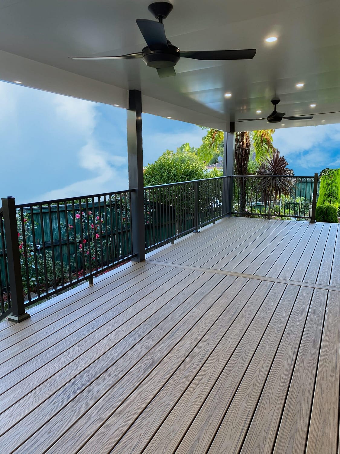 Trex Havana Gold deck combined with and Insulated panel pergola