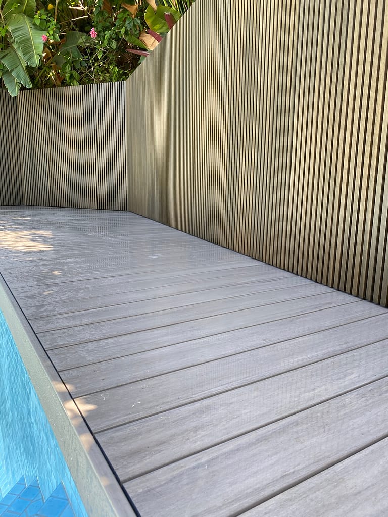 Newtechwood castellation cladding in Aged Wood with an Azek Vintage deck